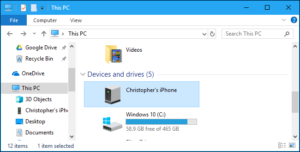 Locate your iPhone in the storage devices present in the This PC sub-menu